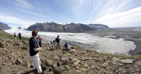 HIkers looking down on glacier