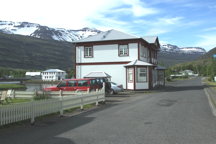 House built right up against the street