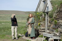 Kristín and Lilja before the farmhouse