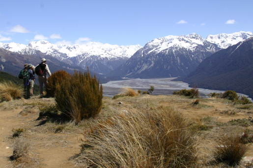 On the trail, snowy mountains in the distance