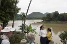 people watch the river