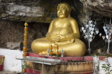 fat gilded figure, not Buddha I think