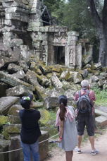 tourists observing ruins