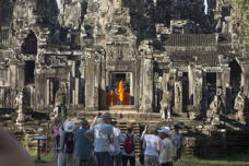 monks in doorway, fairly far away