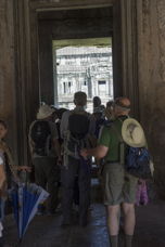 people crowding to an exit