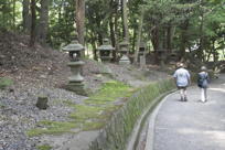 Another brother-sister act Mark and Cindy walking down a path