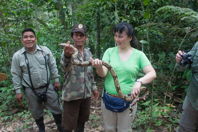 Catherine holds part of a big snake