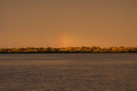 River illuminated by the setting sun, I