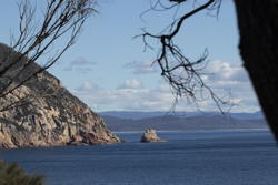 Islet off the coast of a promontory