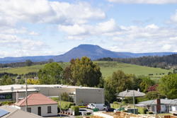 a flat-topped mountain in the distance