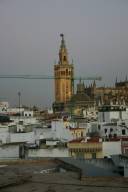 Cathedral at dusk, crane intervening