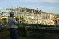 Mark looks out onto the Roman bridge