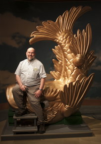 He sits triumphant on the heraldic symbol of the Castle Mark sits triumphant